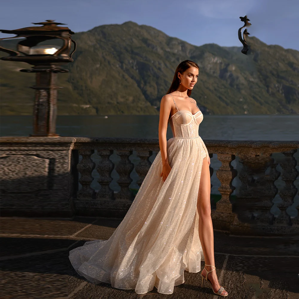 

Elegant Spaghetti Straps Wedding Dresses Sweetheat Neck Bridal Gowns Sequined Sweep Train A-Line High Slit Tulle Весільна сукня