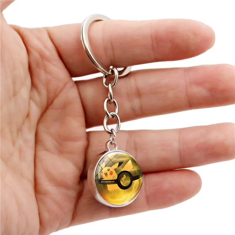 

12 models anime Pokemon Cartoon pikachu model zinc alloy glass key case bag keychain ornament accessories birthday gifts