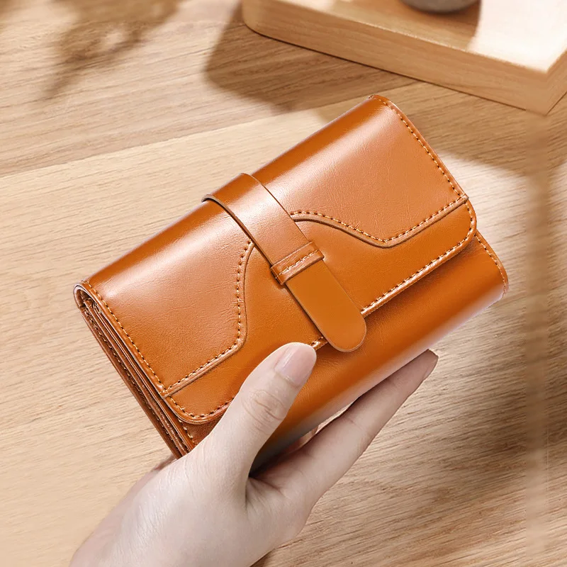 

Korean Version Of The New Wallet Female Short Section Tri-fold Retro Oil Wax Cowhide Buckle Small Coin Clip