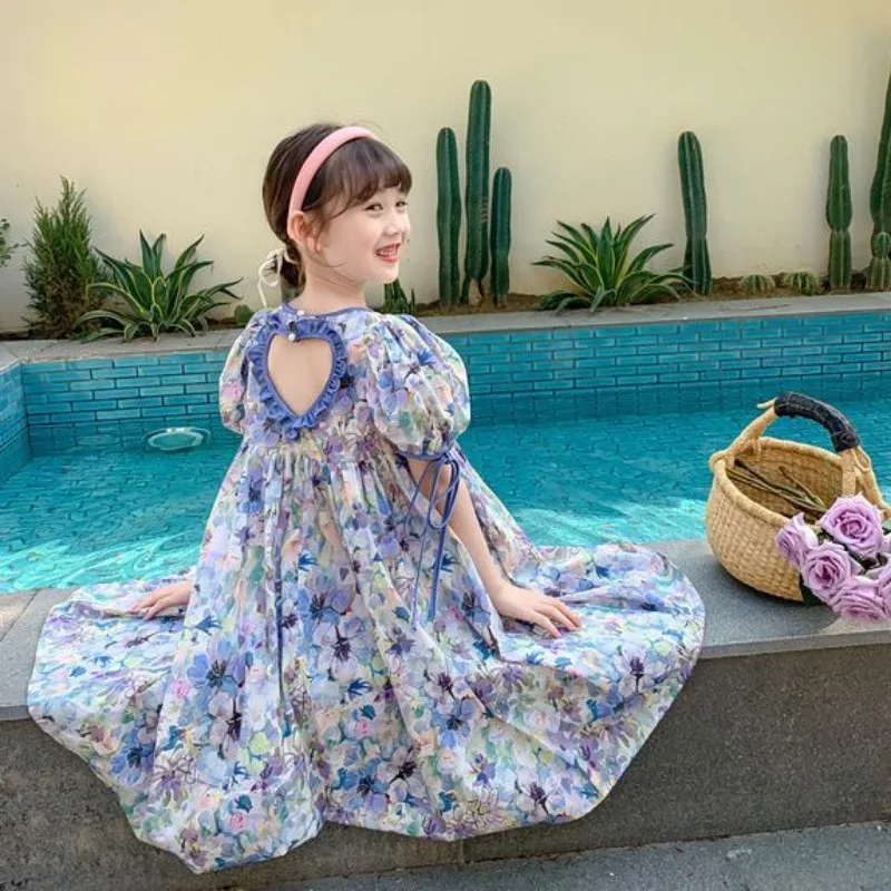 Женское летнее платье с открытой спиной и коротким рукавом