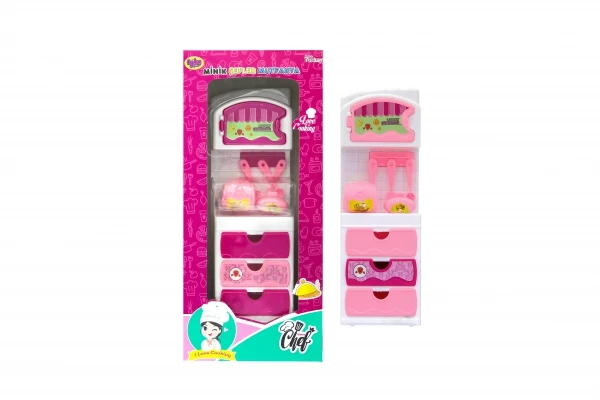 

Tiny chefs doll in the kitchen of fun Komodin ergonomic design practical products in kitchen