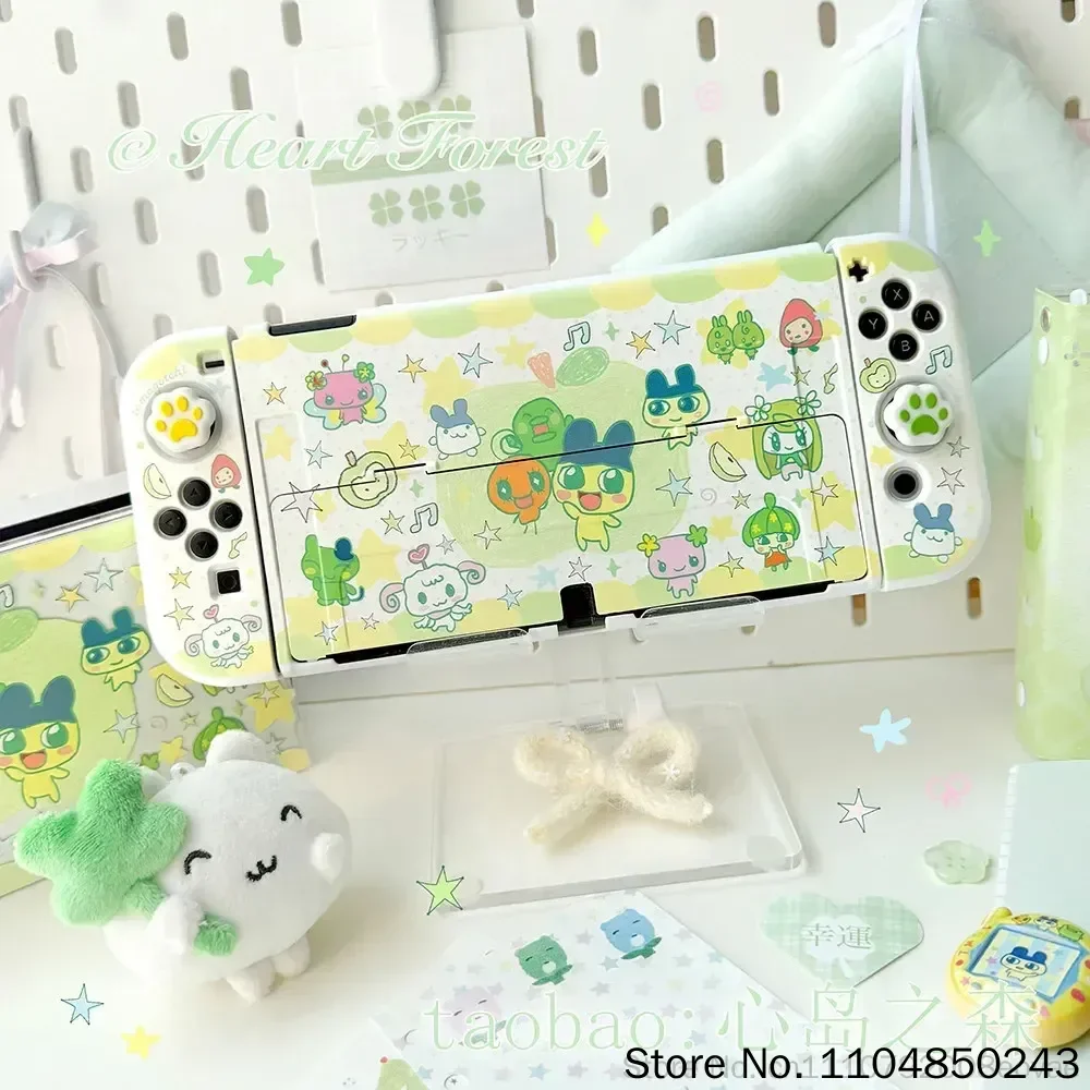 Фото Оригинальный защитный жесткий чехол Tamagotchi Switch с дизайном в виде зеленого яблока и мультяшного лесного пейзажа для игровых консолей Switch Oled Lite №3