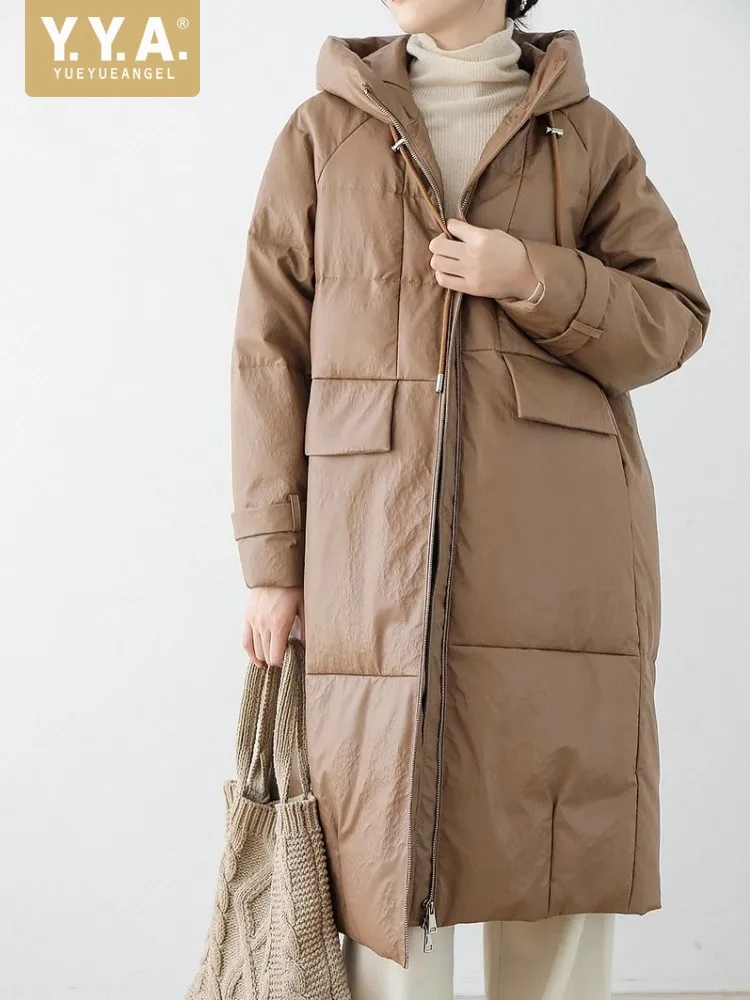 Женский длинный пуховик из натуральной кожи