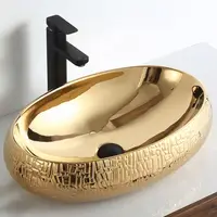 GX2164 China wholesale art sink ceramic bathroom vanity luxury wash basin price oval table top gold washbasin