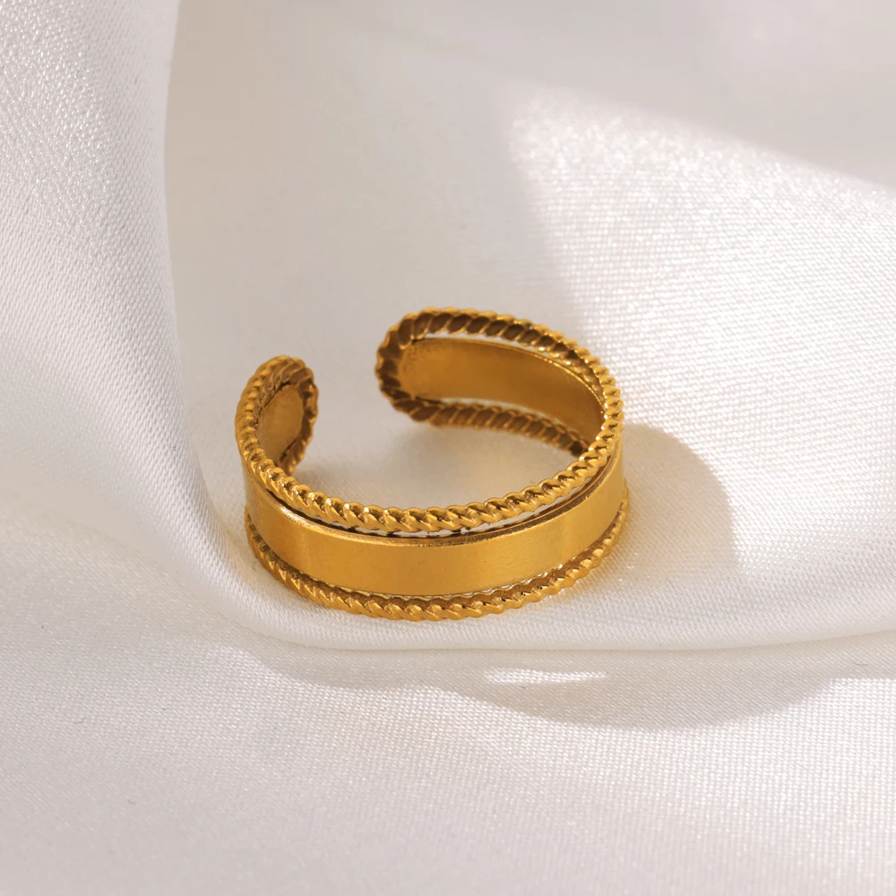 Женское асимметричное кольцо из нержавеющей стали золотистое открытое круглое с