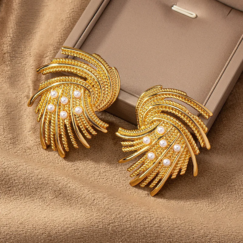 Женские серьги в золотом и серебряном цвете