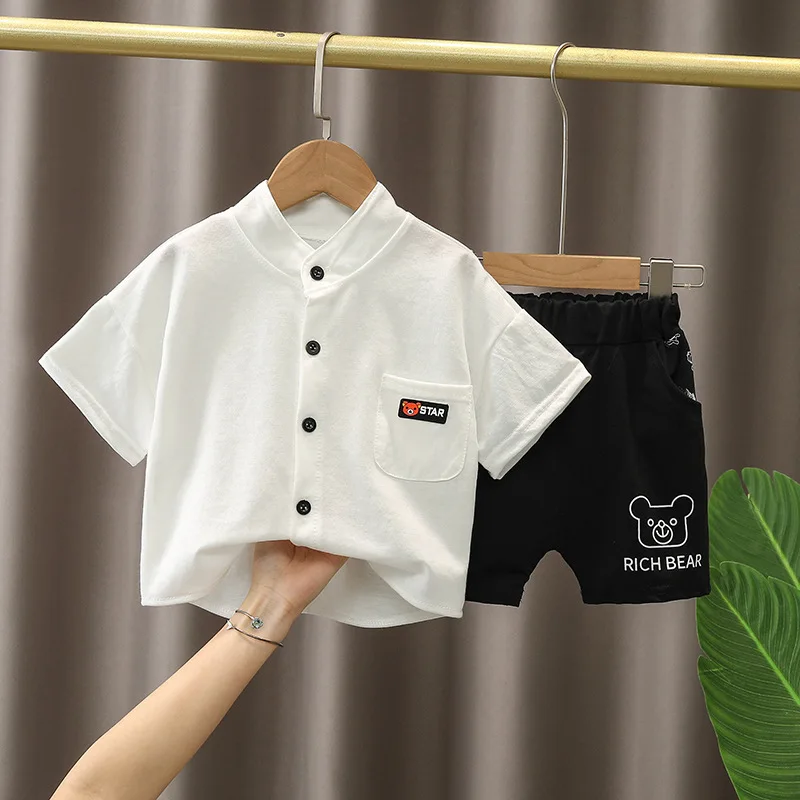 

Fashion Comfortable Kids Boys Summer Boutique Luxury Set Solid Cotton T-shirt with Pocket+Letter Black Shorts Toddler Daily Suit