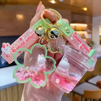 creative floating cherry blossoms rabbit keychain liquid oil rabbit moving milk tea cup acrylic keyring quicksand key chain gift