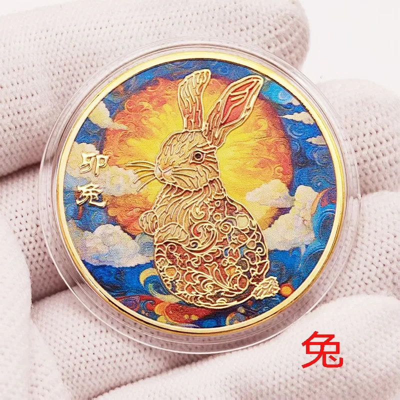 

Золотые монеты с зодиакальными знаками