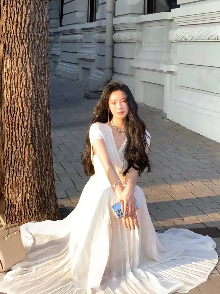 Женское длинное платье с V-образным вырезом без рукавов