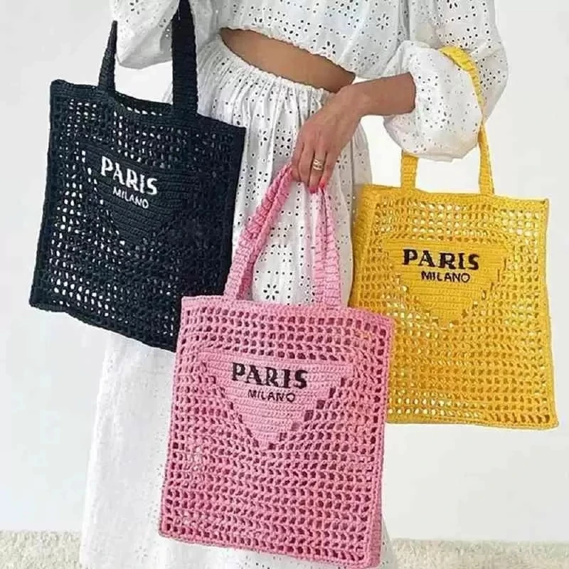 

2023 Designer Brands Hollow Letters Raffia Straw Tote Fashion Paper Woven Women Shoulder Bags Summer Beach Handbag