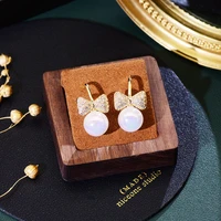 new simple fashion ladies stud earrings shiny round imitation pearl womens wedding accessories diamond bow small gift 2022