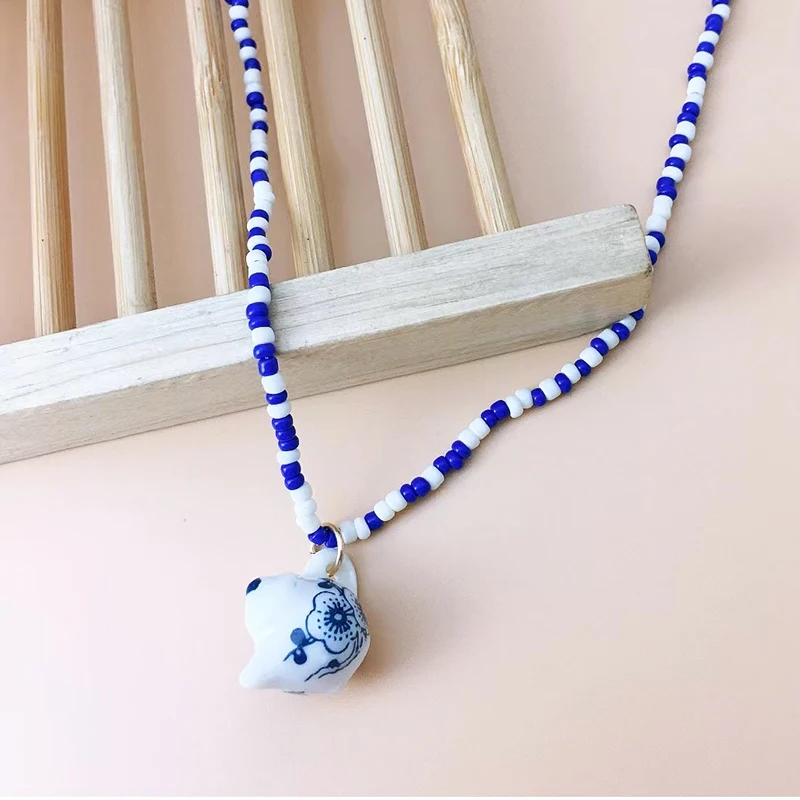 Женское винтажное ожерелье ручной работы из рисовых бусин с синей и белой эмалью