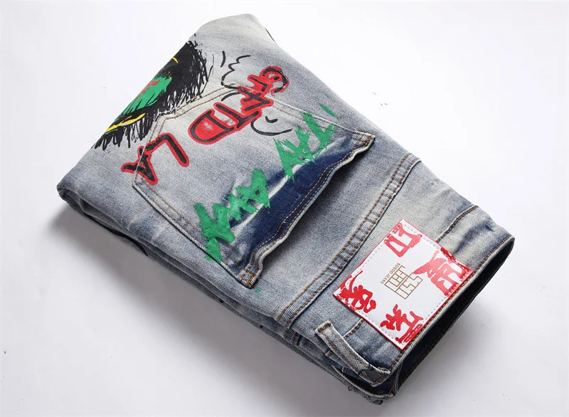 New Denim Mens Pants Punk Trend Retro Blue Broken Hole Slimming Stretch Printing and Dyeing Mens Jeans