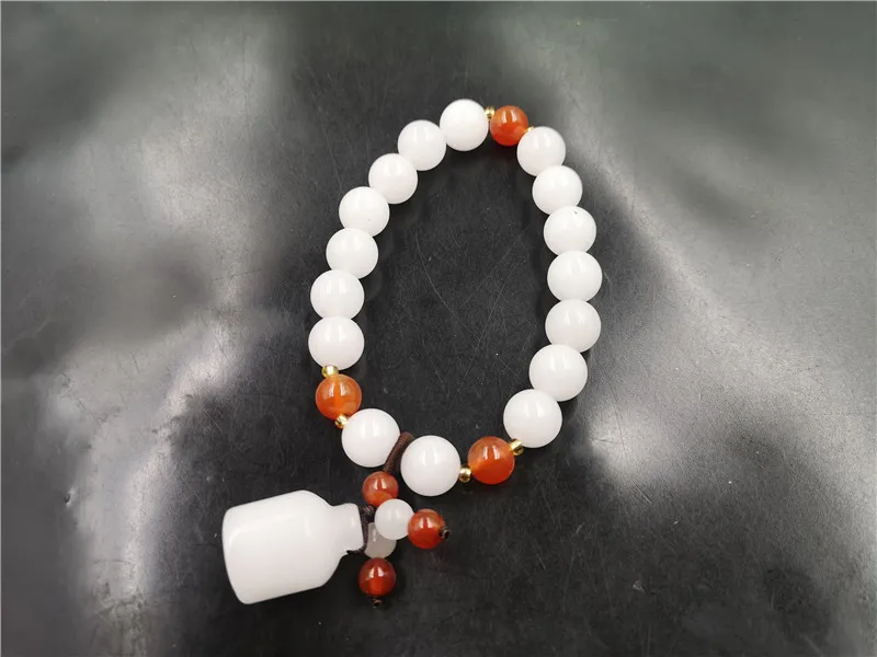 

Natural Golden Silk Jade Ball Bracelet Ladies White Jade Bracelet Special Offer