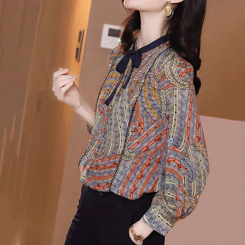 

Butterfly knot chiffon shirt female long sleeve 2022 spring and autumn new Korean version of loose large size thin wild shirt