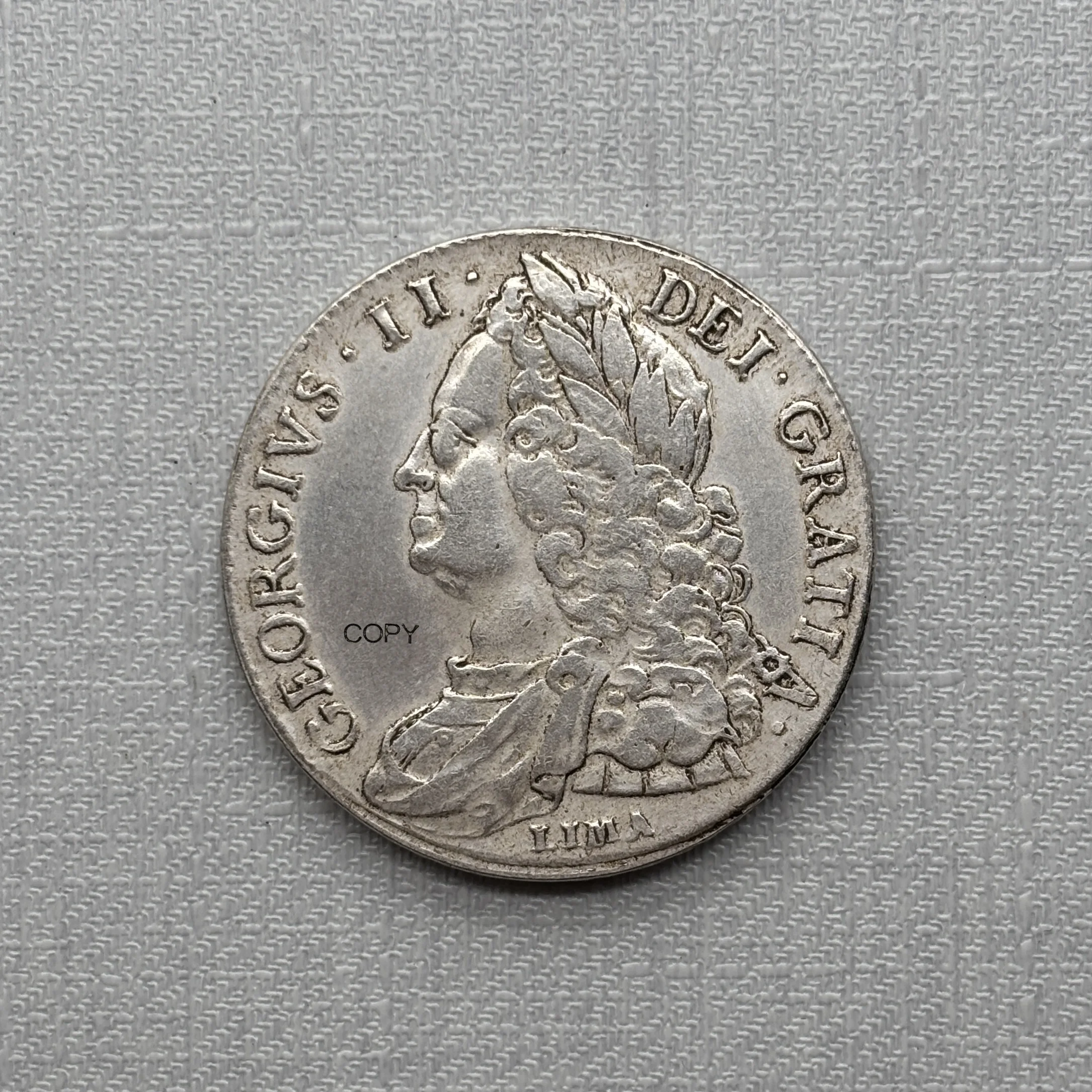 Фото Великобритания 1746 1 корона Георга II, старый тип, с изображением бюста, металлическая, посеребренная, копия, сувенирная монета №1