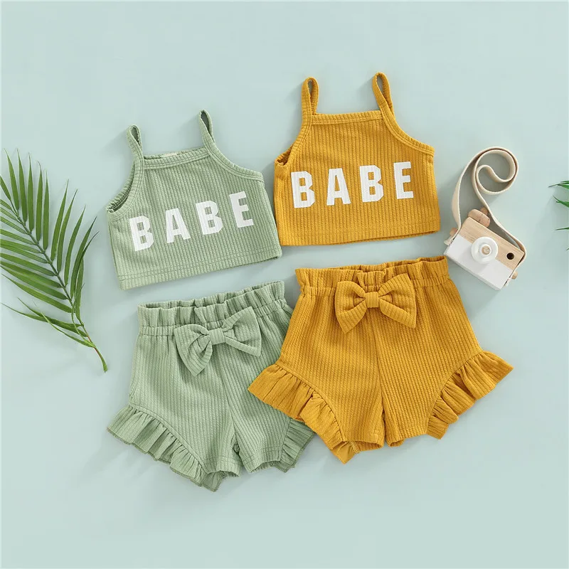 

Newborn Baby Girls 2 Pieces Outfits Infants Ribbed Letter Print Sleeveless Sling Tank Tops +Bow Elastic Waist Solid Color Shorts