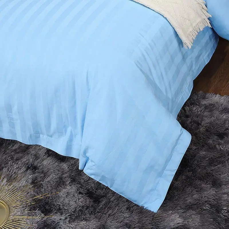 40-компонентный комплект из четырех предметов хлопкового атласа в полоску.