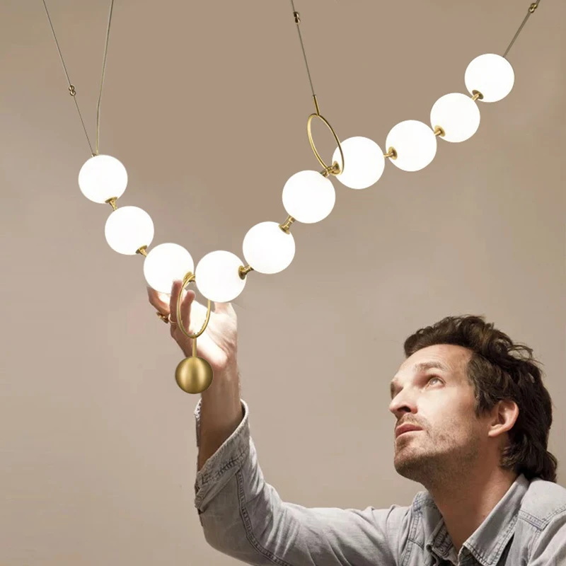 

Современные светодиодные подвесные светильники в виде белого стеклянного шара для ресторана, зала, креативное ожерелье, дизайнерские декоративные светильники с 10 лампочками