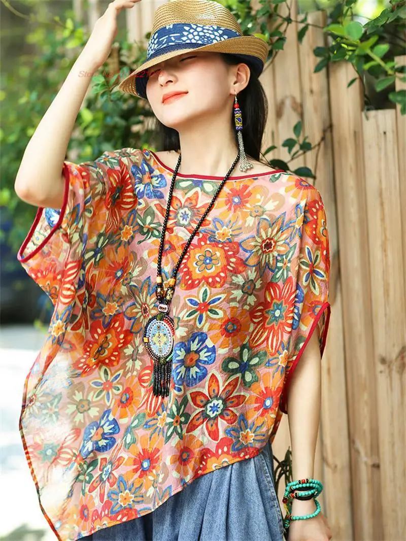 

2023 Китайская традиционная футболка Этническая рубашка с национальным цветочным принтом Восточная свободная Асимметричная рубашка с круглым вырезом женская уличная одежда