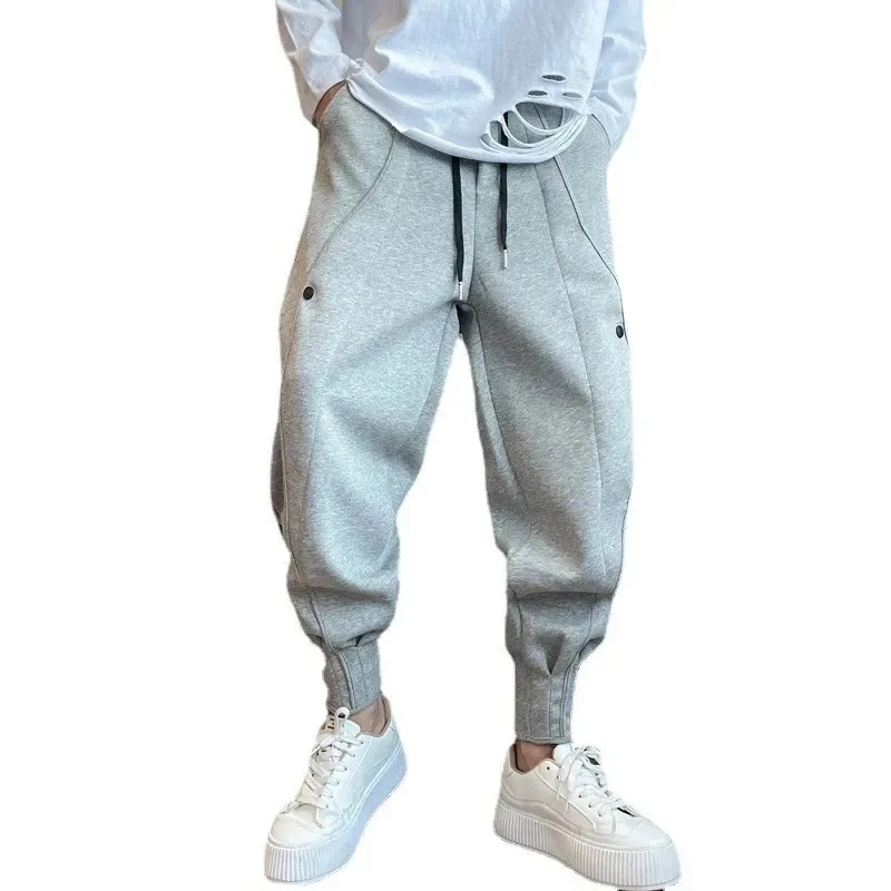 

2023 Brand Men's Casual Sports Pants Fashion Bind Feet Button Outdoors Men Elastic Zipper Bunched Foot Trousers