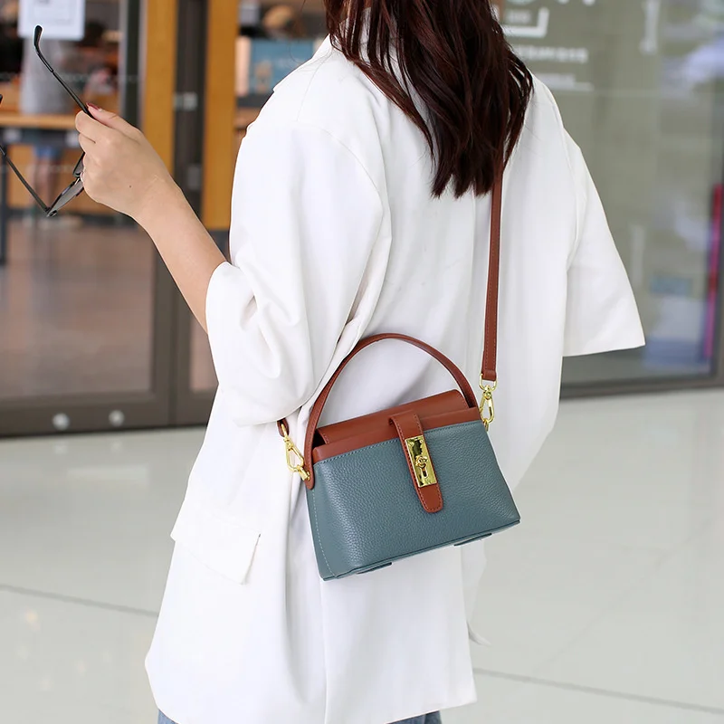 

high quality luxury brand Live broadcast leather hand High sense Small crowd color contrast box Fashion cowhide bag Crossbody fe
