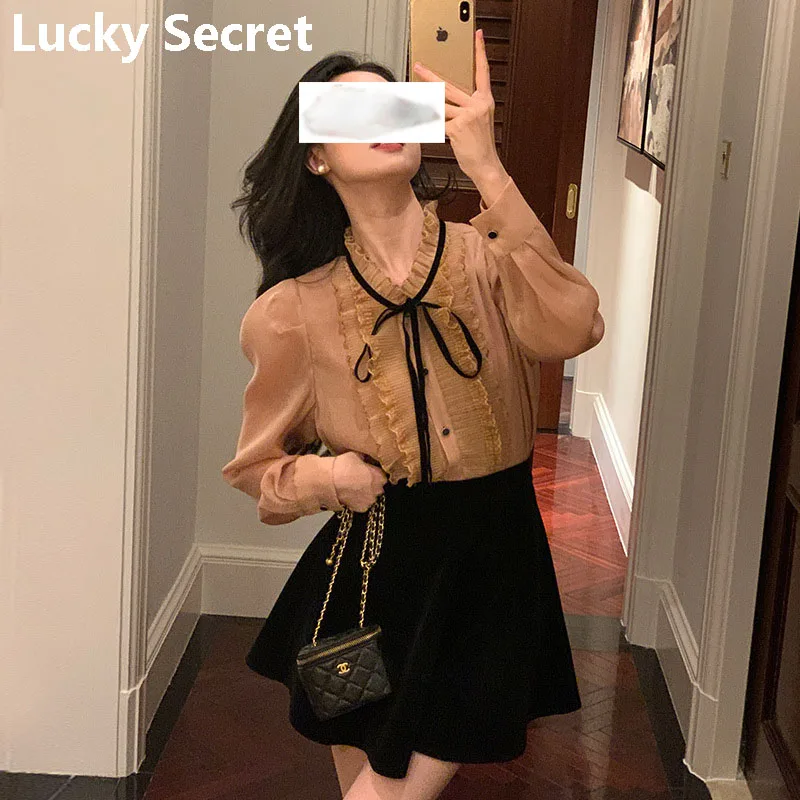 

Clothing female shirts and blouses Autumn new Korean version pressed pleated wood ear lace long-sleeved shirt blouse