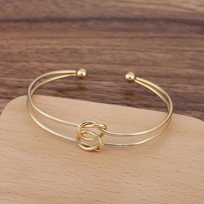 

2022 Trendy Hot Selling Fashion Simple Color Preservation Metal Knotted Open Bracelet Creative Gift Jewelry