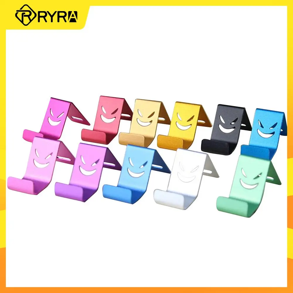 

RYRA 1PC Portable Metal Phone Holder Devil Smiley Face Desk Universal Phone Stand High Quality Mobile Phone Holder Accessories