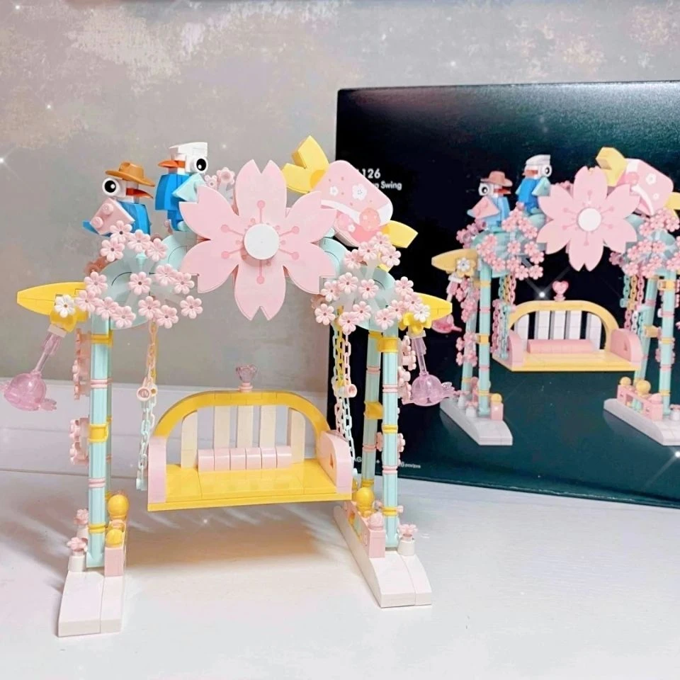 

626pcs Mini Sakura Swing Seat Building Blocks City Street View Friends Romantic Flower Birds Bricks Toys For Children