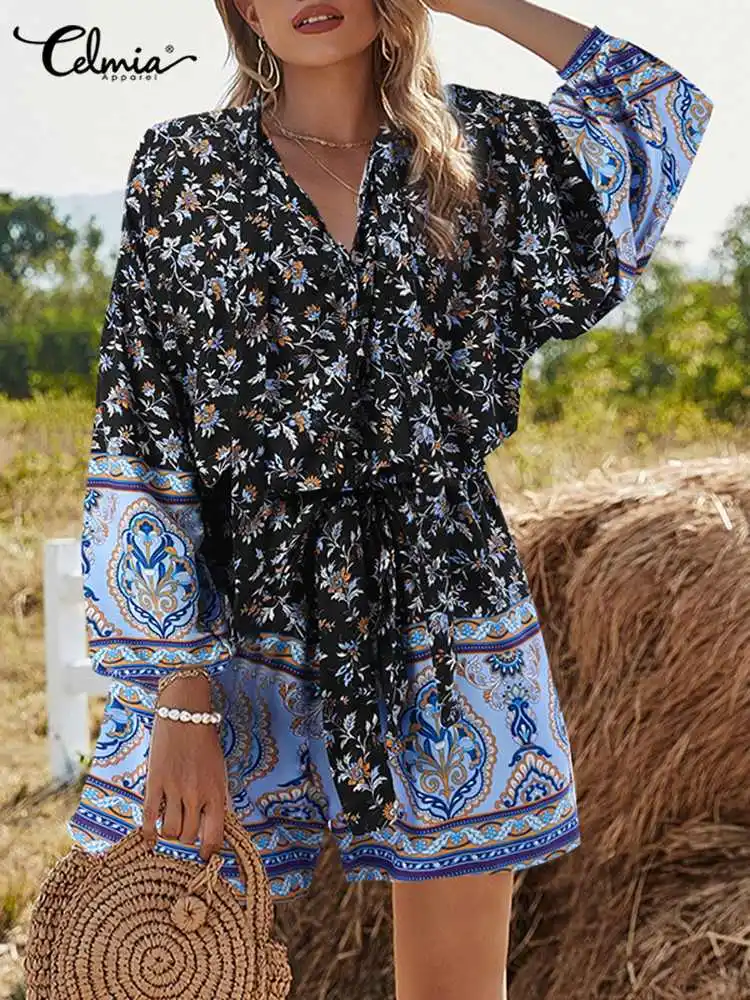 

Celmia Women Bandage Waist Rompers Casual Puff Sleeve Holiday Overalls Bohemian Floral Print Short Jumpsuits Summer Playsuits