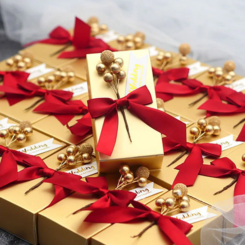 

50pcs European Bowknot Candy Boxes Favor Gift Sweet Golden Hand Boxes Packaging Bag Boxes Baby Shower Wedding Party Decoration