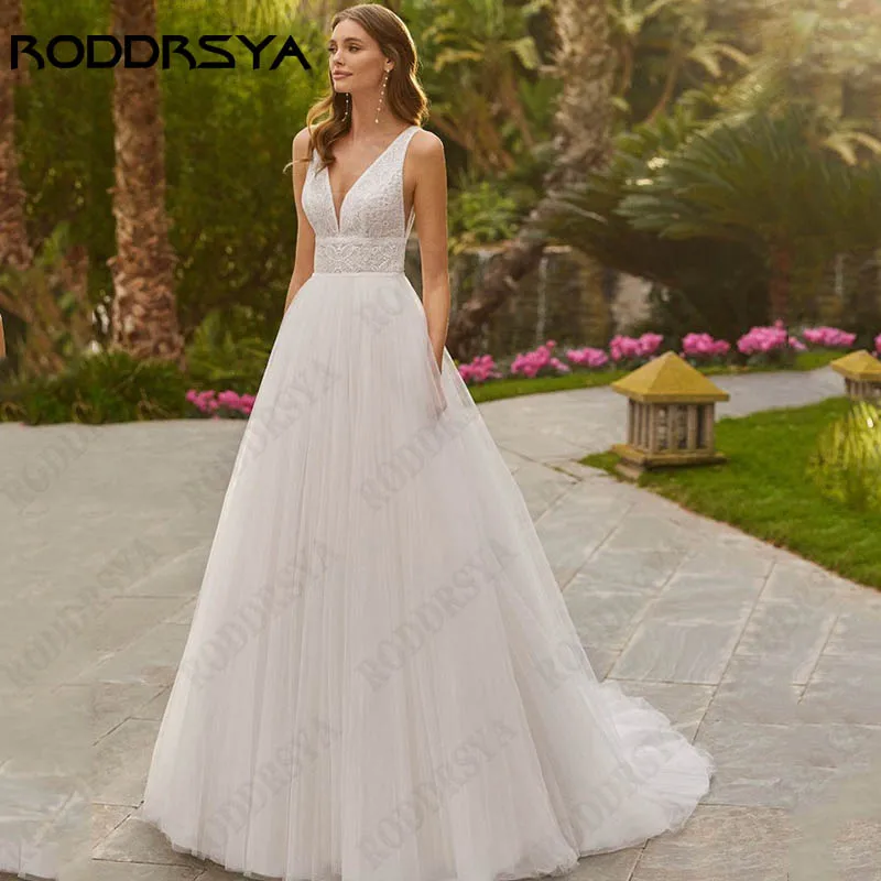 

Свадебное платье RODDRSYA с кружевной аппликацией и V-образным вырезом для женщин, тюль без рукавов, трапециевидная юбка для невесты, блестящее платье с открытой спиной Кружевные аппликации V-образным вырезом свадебное