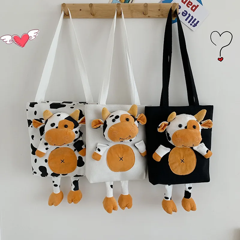 

Girls cow pattern cartoon big bag new canvas bag shoulder bag student handbag