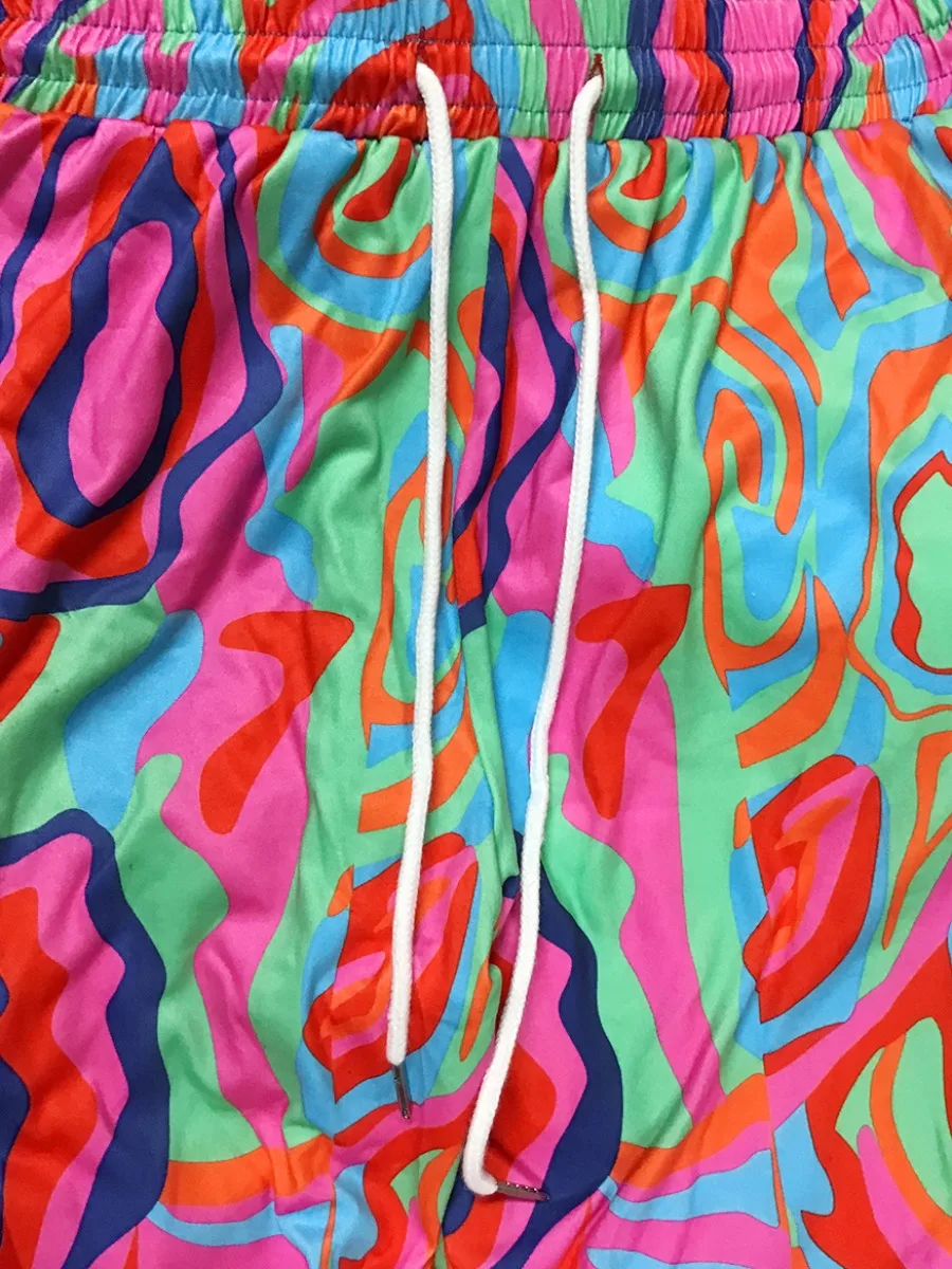 Брюки-клеш женские разноцветные с завышенной талией и принтом