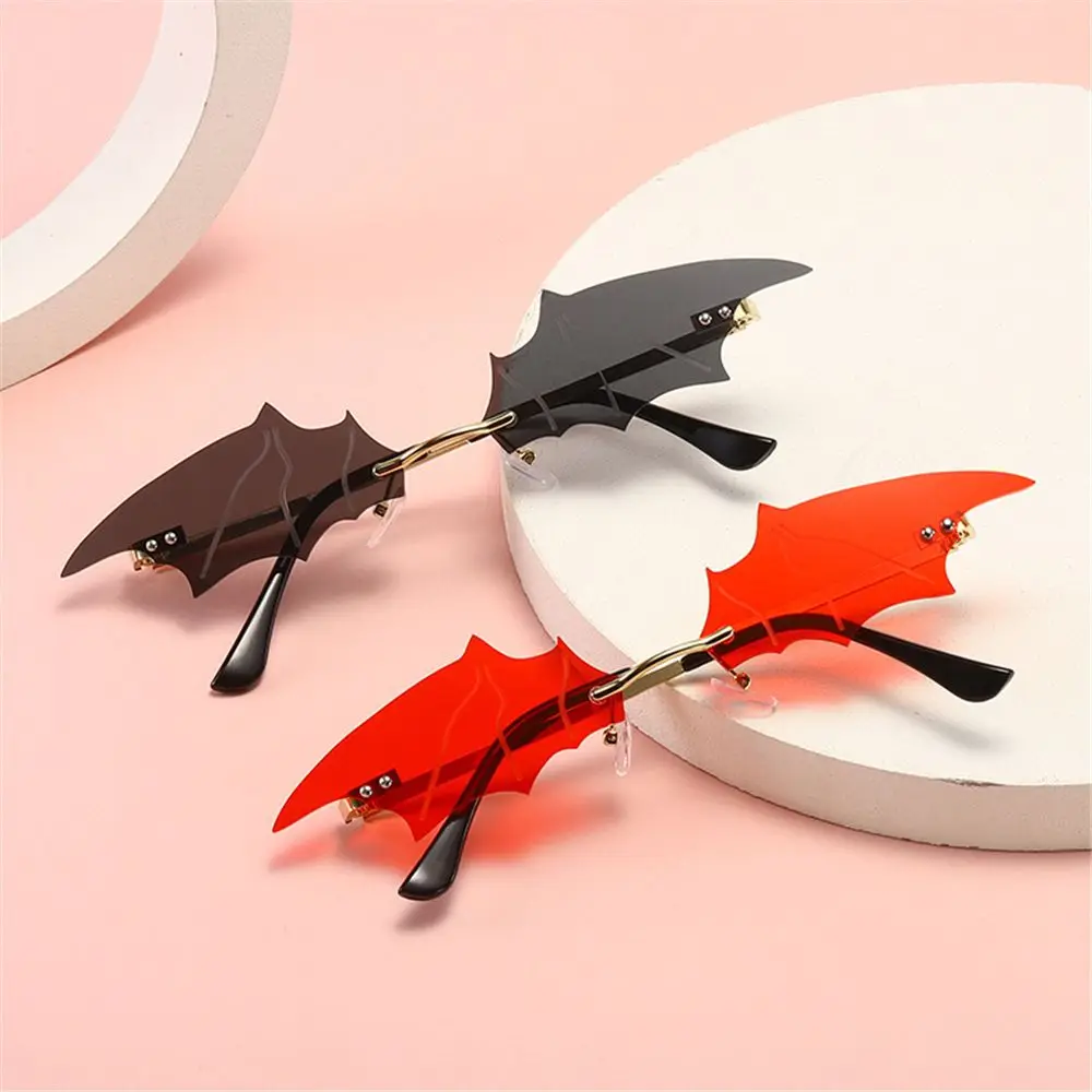 

Trendy Eyewear Metal Frame Party Slim Sunglasses Bat Shaped Rimless Women Sunglasses