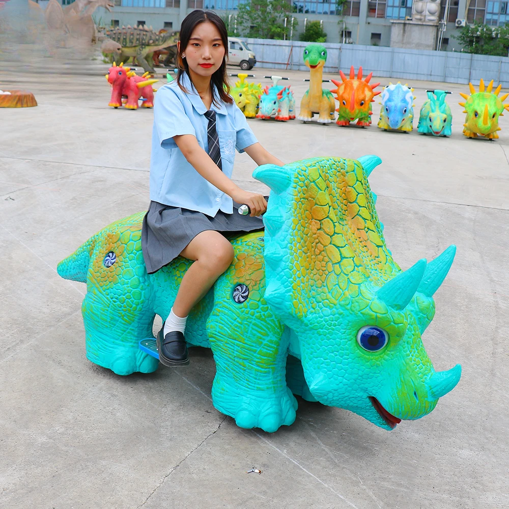 Детский скутер-динозавр работающий от монет