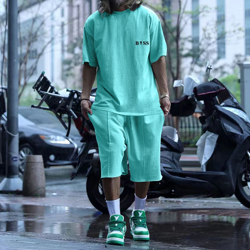 Summer Hot Sale Solid Color men's Street Trendy men's Casual Two-piece Short-Sleeved T-shirt + Loose Shorts