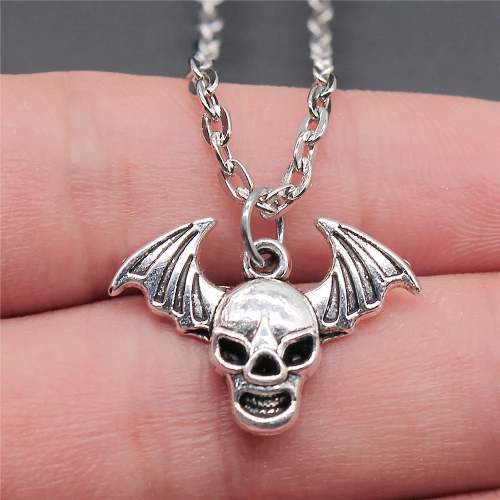 

Женское ожерелье с подвеской в виде черепа и крыла ангела, серебристого цвета, 22x16 мм