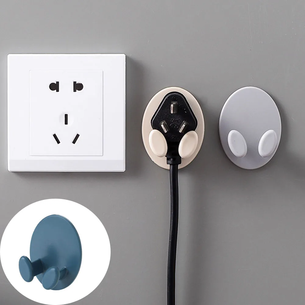

2Pcs Plastic Power Wire Socket Storage Rack Wall Hang Sticky Bracket Oval Plug Hook Home Accessories Multi-Purpose Hooks