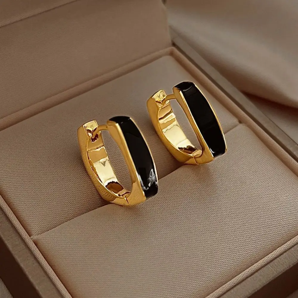 Геометрические серьги цвета красного золота универсальные элегантные для