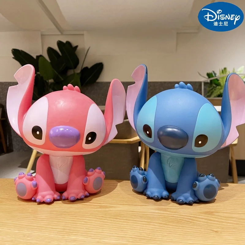 

Disney Stitch Angel Piggy Bank Cartoon Anime Money Box Pvc Action Model Kawaii Doll Decorative Collectible Kids Toy Xmas Gift