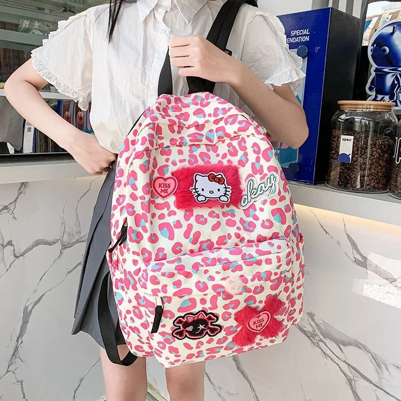 

Anime Cartoon Sanrio Kawaii Hello Kitty Girl Backpack Korean Ins Cute Leopard Print Backpack Student School Bag Birthday Gift