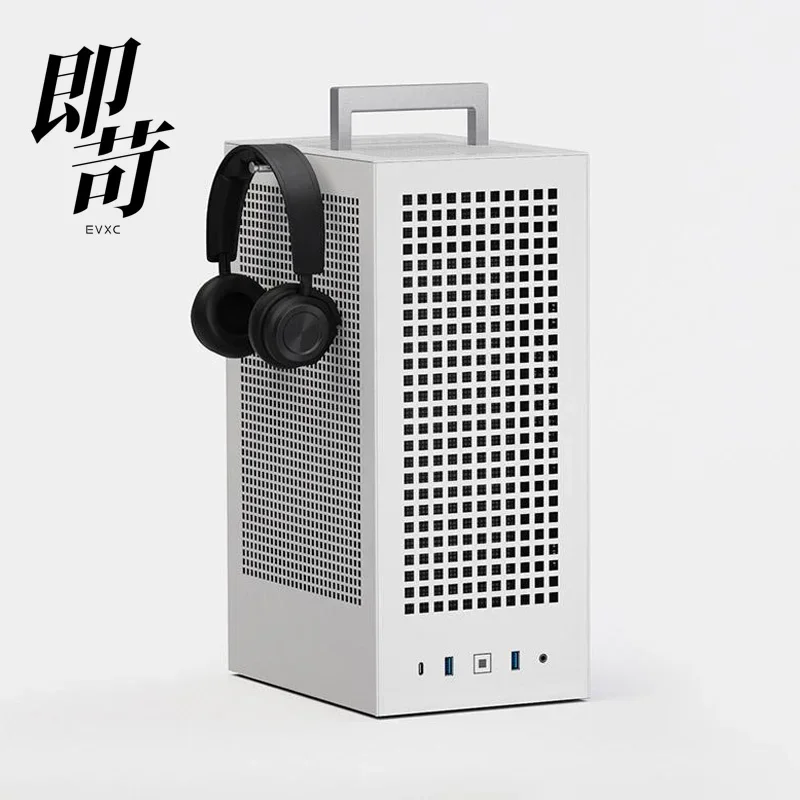 Фото Маленький корпус HYTE ITX Revolt 3, удобная ручка, быстроразъемная конструкция, металлическая сетка №1