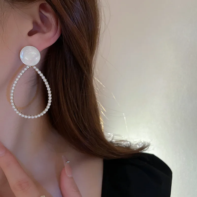 

Женские серьги в богемном стиле, трендовые Винтажные серьги-подвески с искусственным жемчугом и кристаллами, 2022