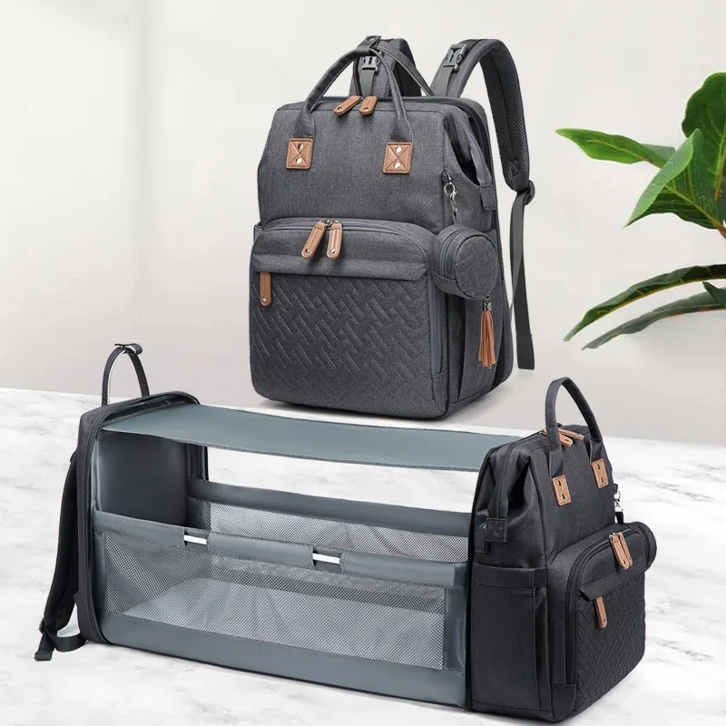 

2022 New Baby Bed Backpack Portable Mommy Diaper Bag Folding Crib Multifunctional Mother and Baby Bag Factory Outlet