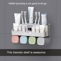 bathroom toothbrush storage rack rack free punch suction wall bracket automatic squeeze toothpaste box