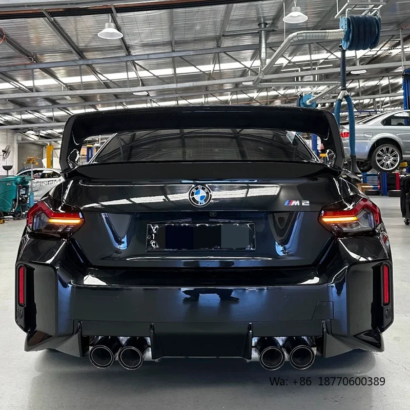 Фото Спойлер из сухого карбона для BMW M2 G87, легкий, в стиле Alpha N, высокое расположение на крыше №4