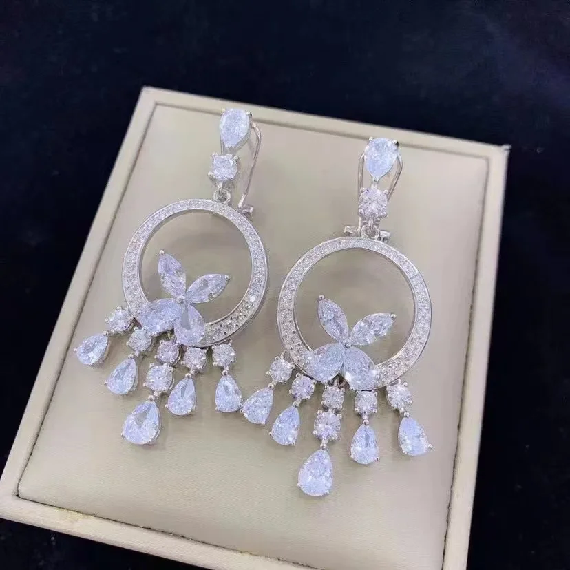 

Серьги 925 пробы серебряные с бантом из кубического циркония